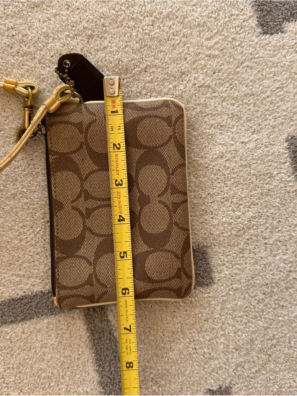 Coach Brown and Cream Signature Zip Wristlet with Gold Hardware